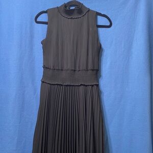 Classic pleaded fully lined black dress size 4 used sleeveless